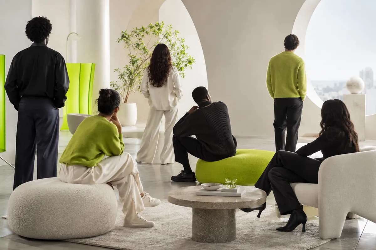 A diverse collection of abstract digital presenters arranged in a bright studio