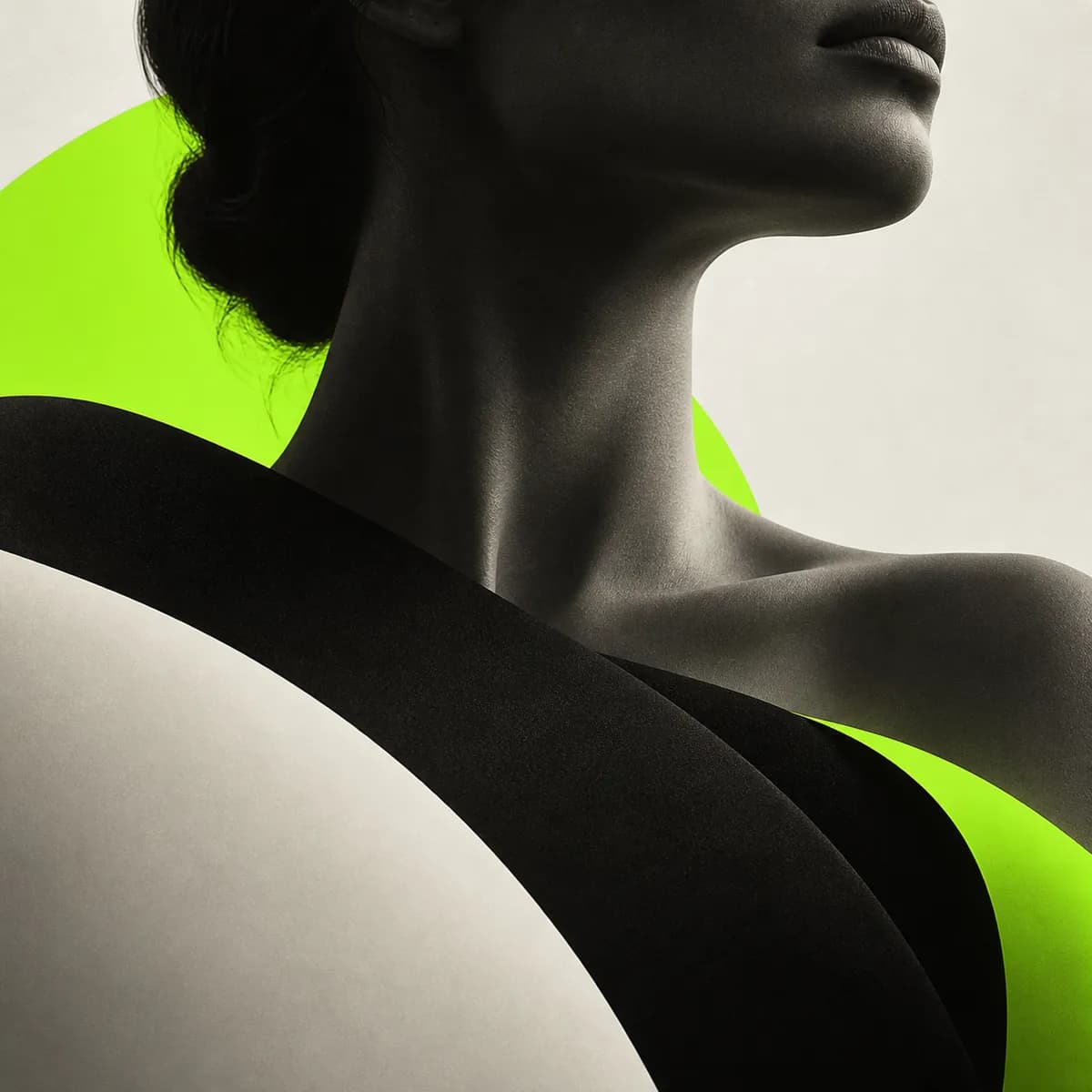 Abstract cropped portrait silhouette in a lime and charcoal studio