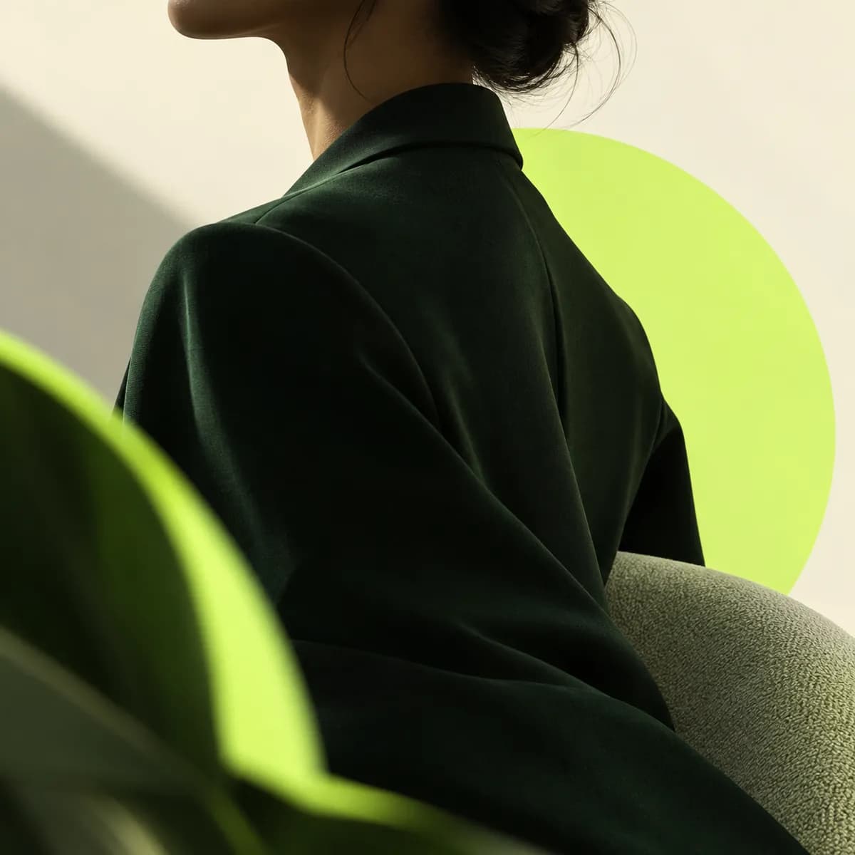 Abstract cropped portrait silhouette with soft green and cream geometry