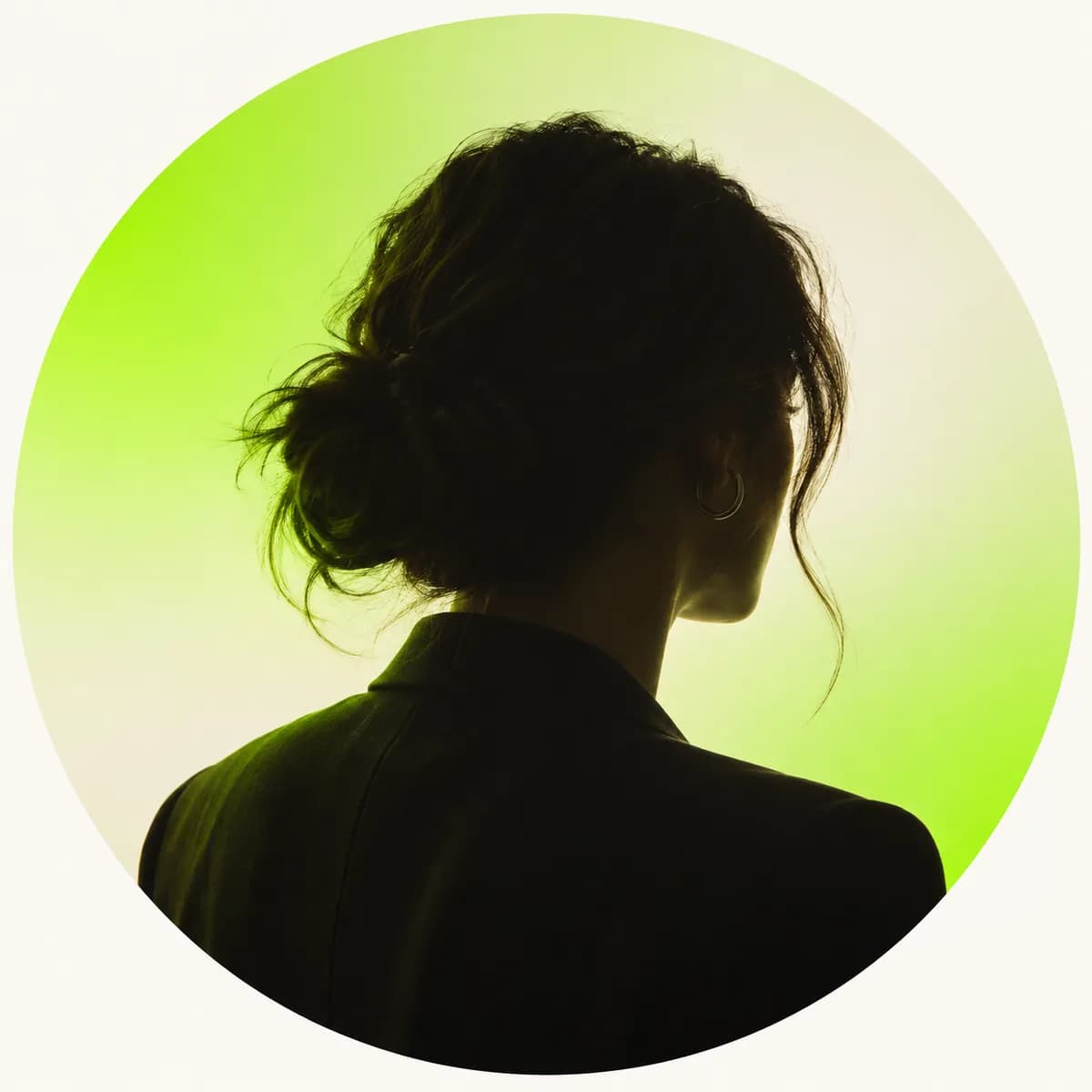 Abstract silhouette portrait of a creative director against a lime and cream background