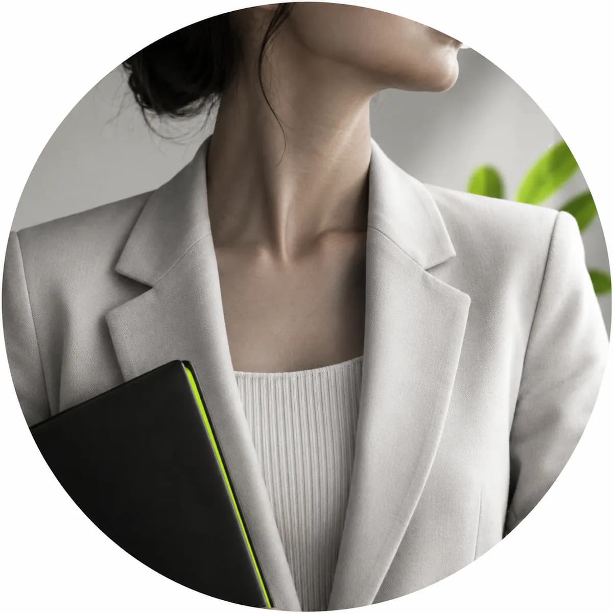 Anonymous customer portrait shown in grayscale with the face cropped below the chin