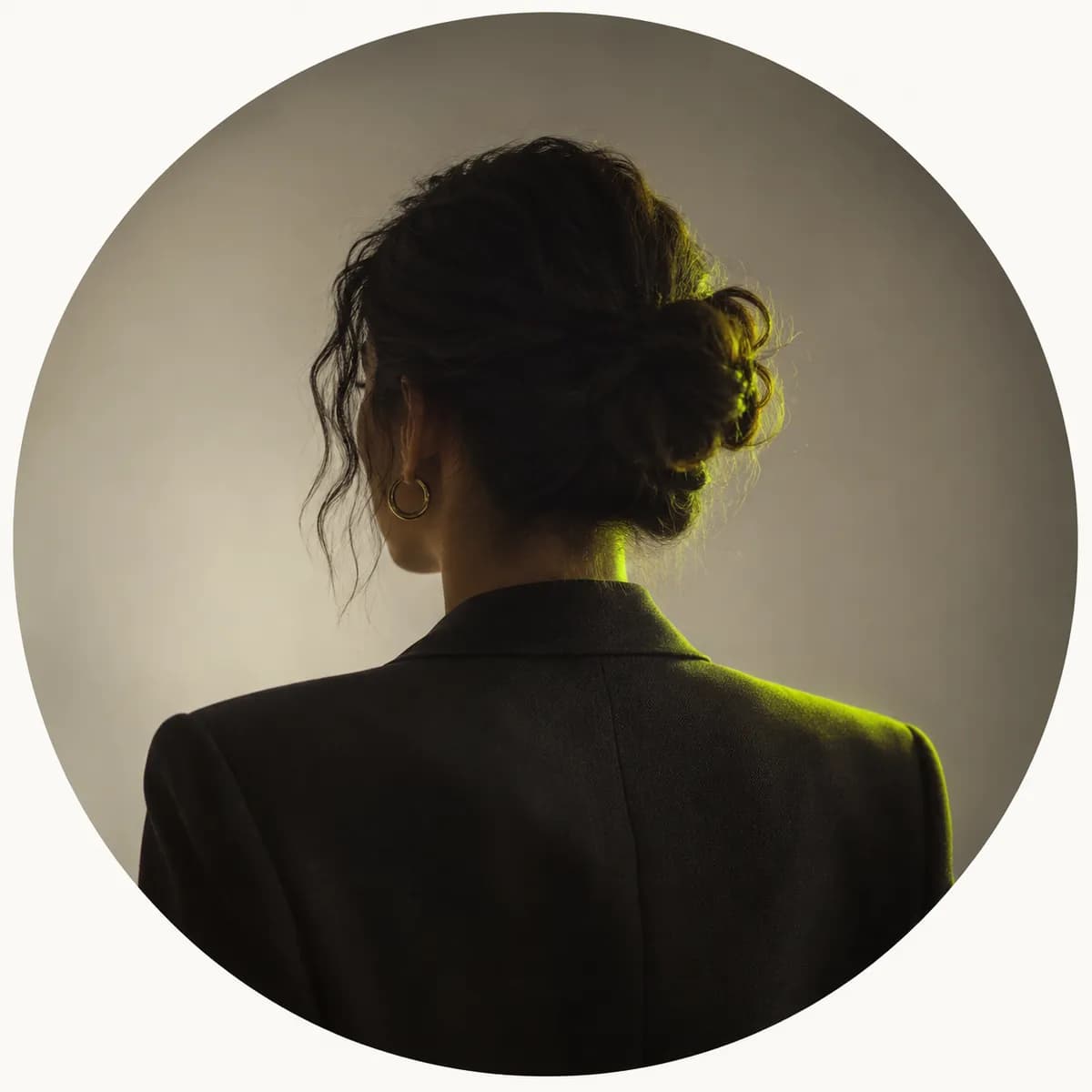 Abstract silhouette portrait of a creative operations lead viewed from behind