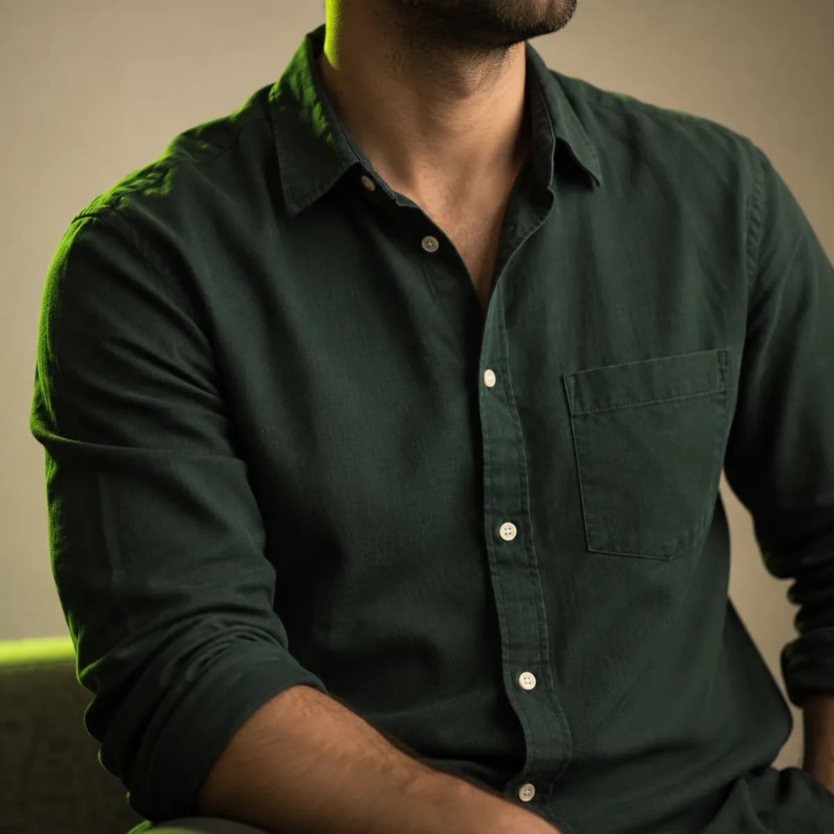 Portrait of Jordan Ellis shown from the shoulders down