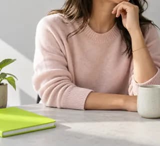 Cropped editor in a neutral room with lime color detail